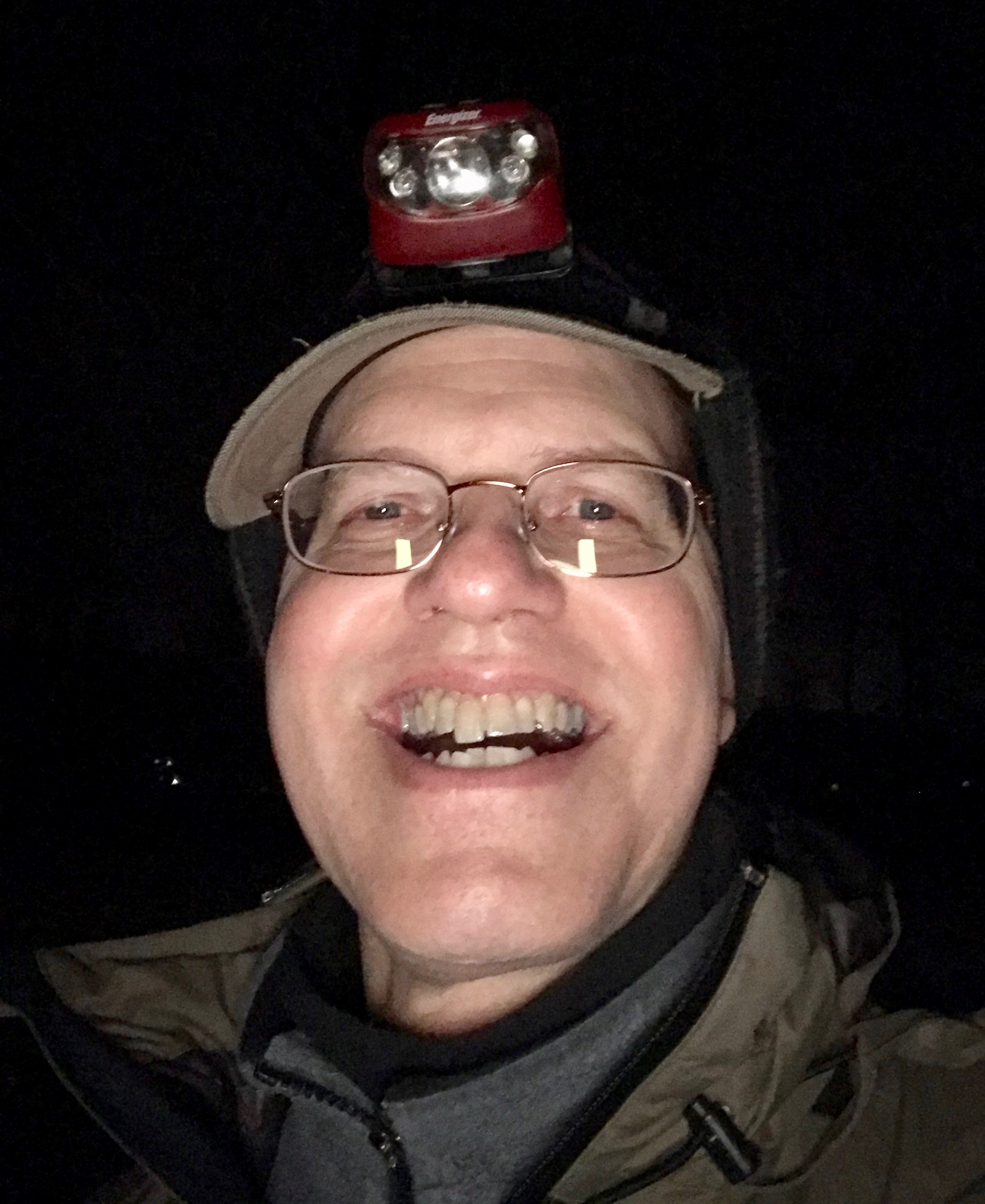Flashlight hat man